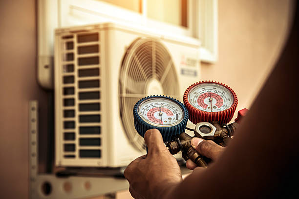 Professional Air Conditioning Service technician working in Fort Thomas, KY